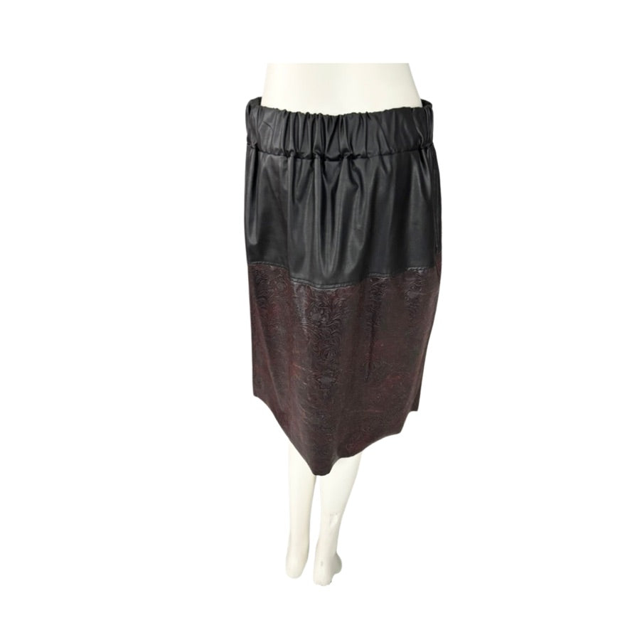 Black and burgundy pencil skirt on a mannequin against a white background