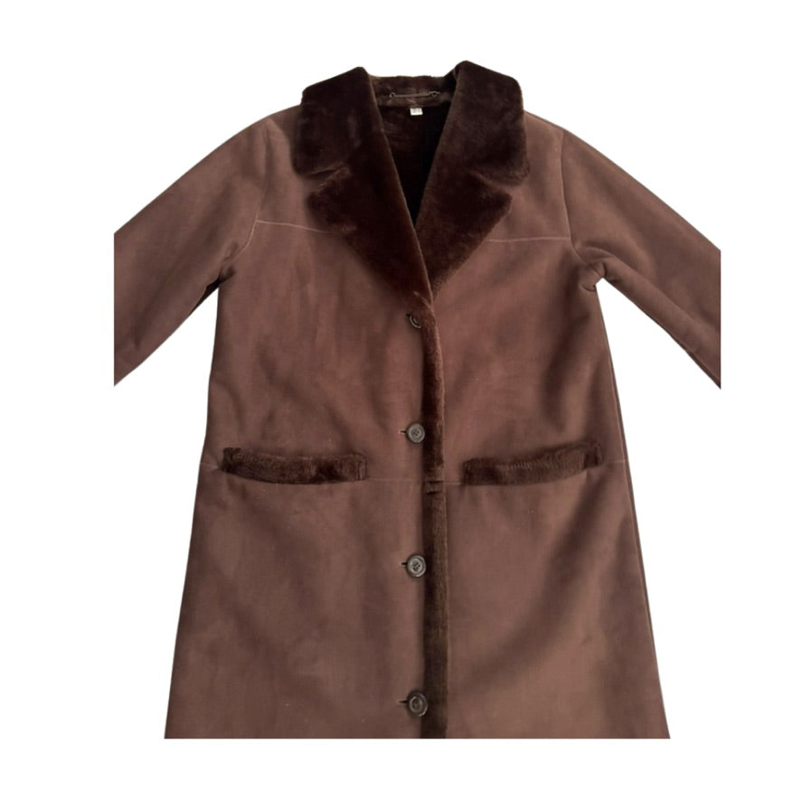 Brown coat with fur trim on a white background