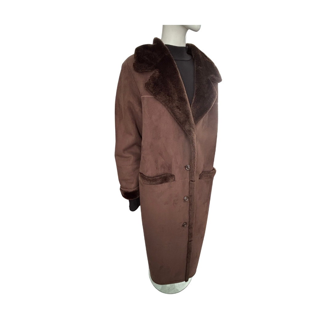 Brown coat with fur collar on a mannequin against a white background