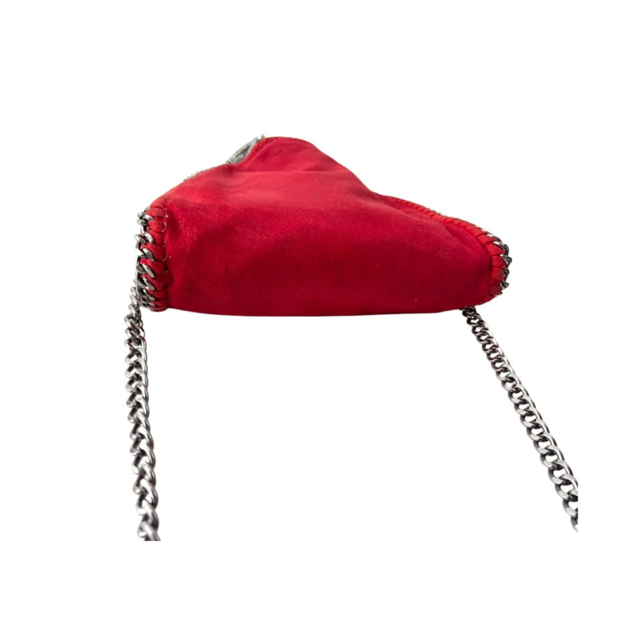 Red fabric pouch with silver chains on a white background