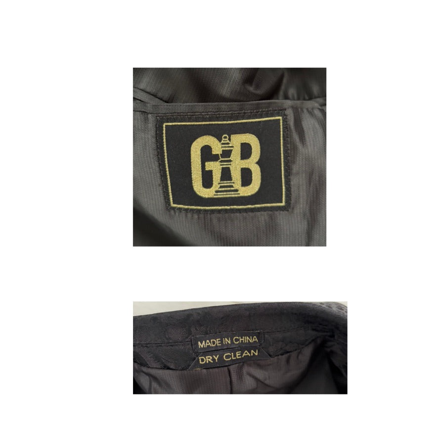 Close-up of a label with 'GB' logo on a garment, with 'Made in China' and 'Dry Clean' text below.