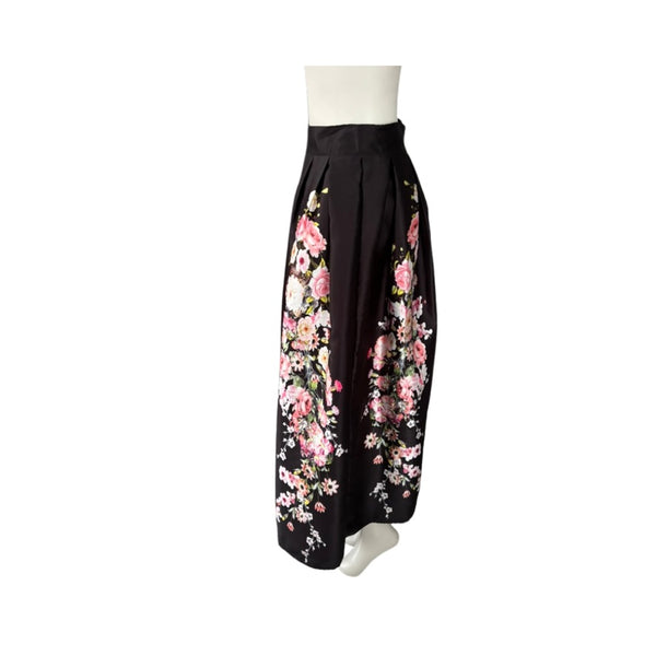 Black skirt with pink floral pattern on a white background