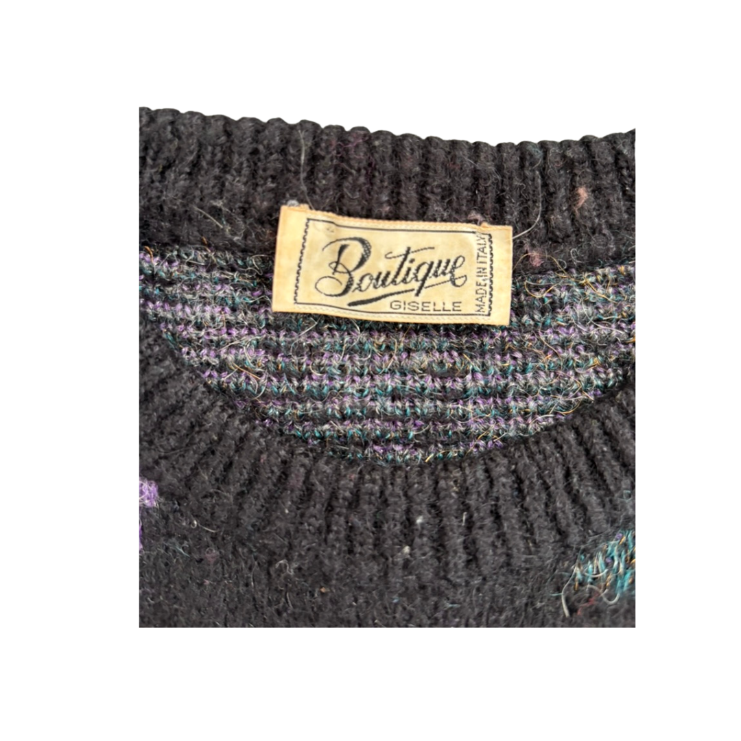 Close-up of a textured fabric with a 'Boutique' label on a white background