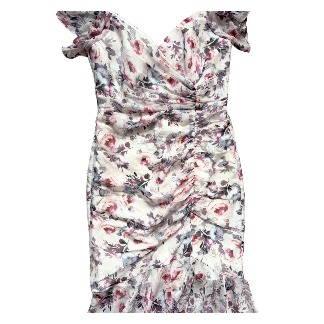 Floral dress with ruched design on a white background