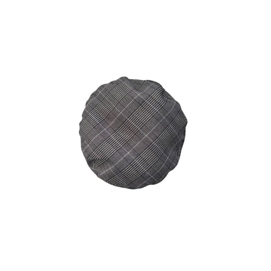 Plaid patterned beret on a white background