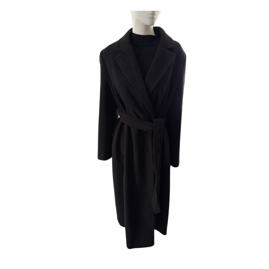 Black coat on a mannequin against a white background