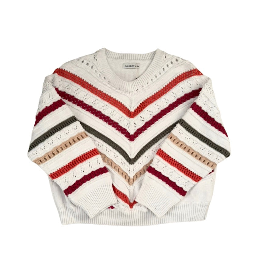Striped sweater with red, beige, and gray patterns on a white background