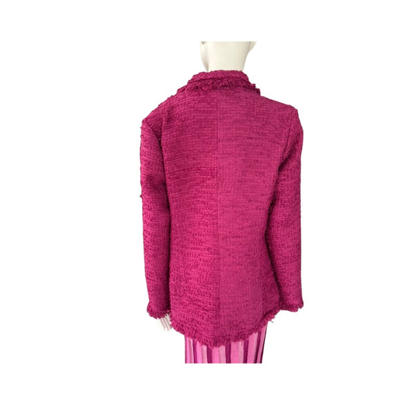 Mannequin wearing a pink textured sweater on a white background
