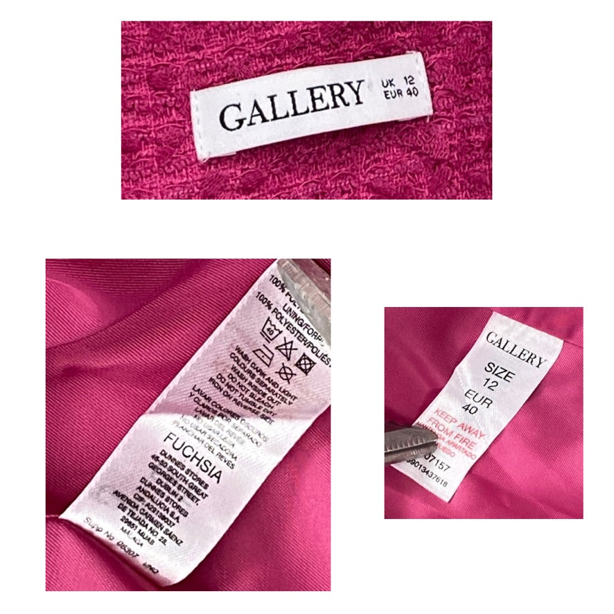 Close-up of clothing labels on a pink fabric background