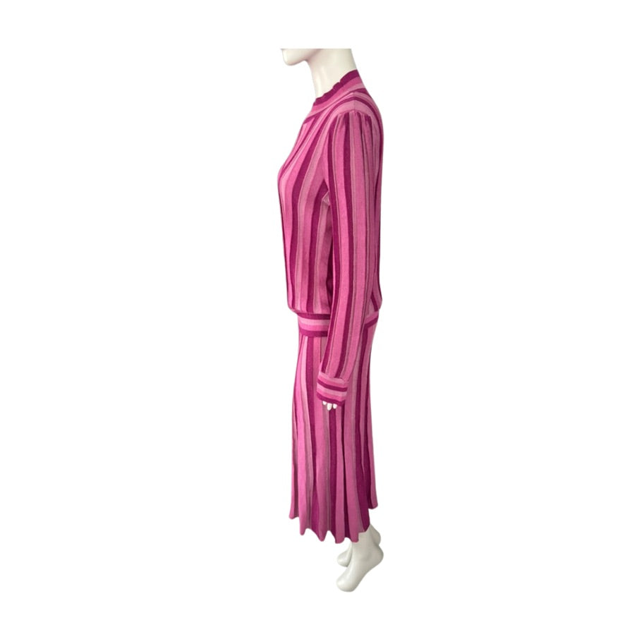 Mannequin wearing a pink striped outfit on a white background