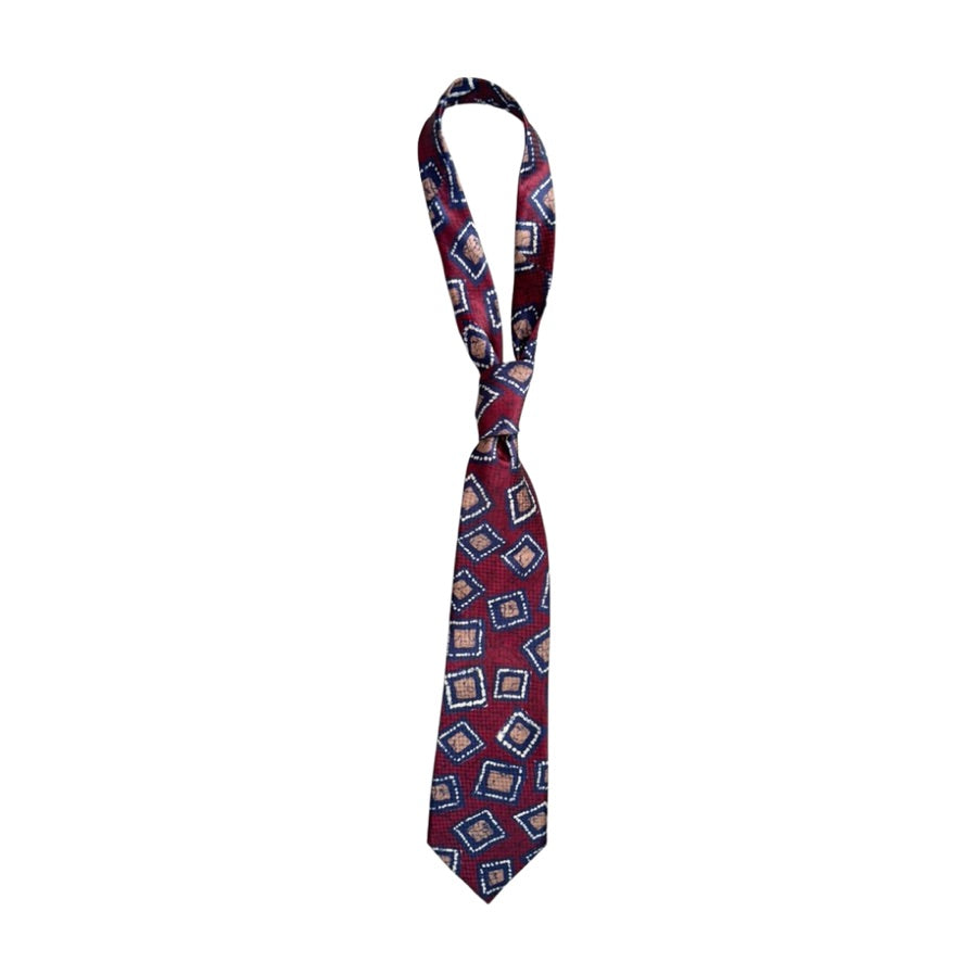 Burgundy patterned tie on a white background