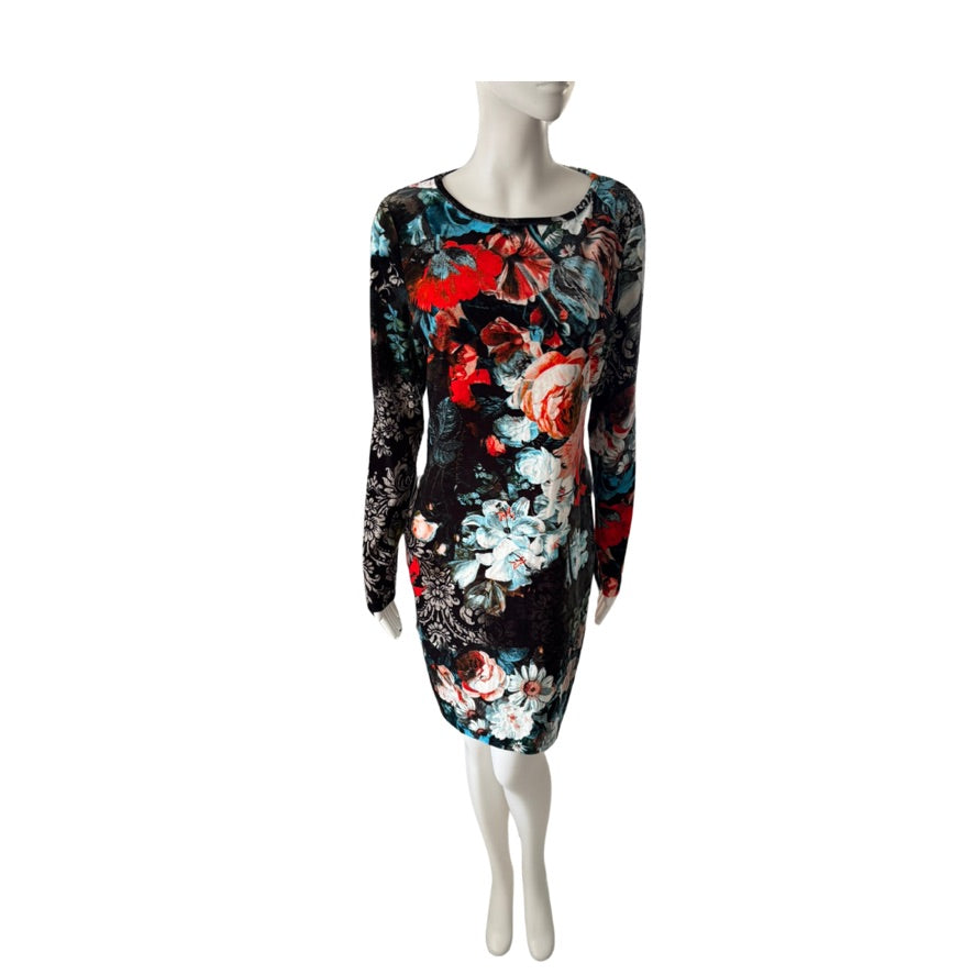Floral patterned dress on a mannequin against a white background
