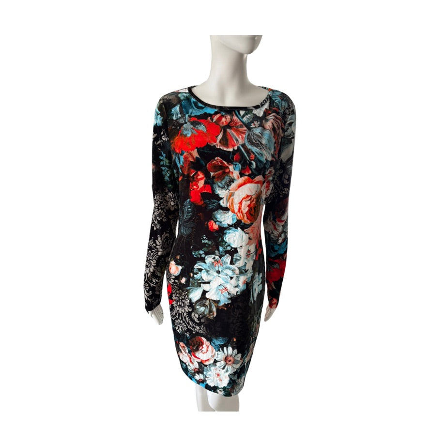 Floral dress on a mannequin against a white background