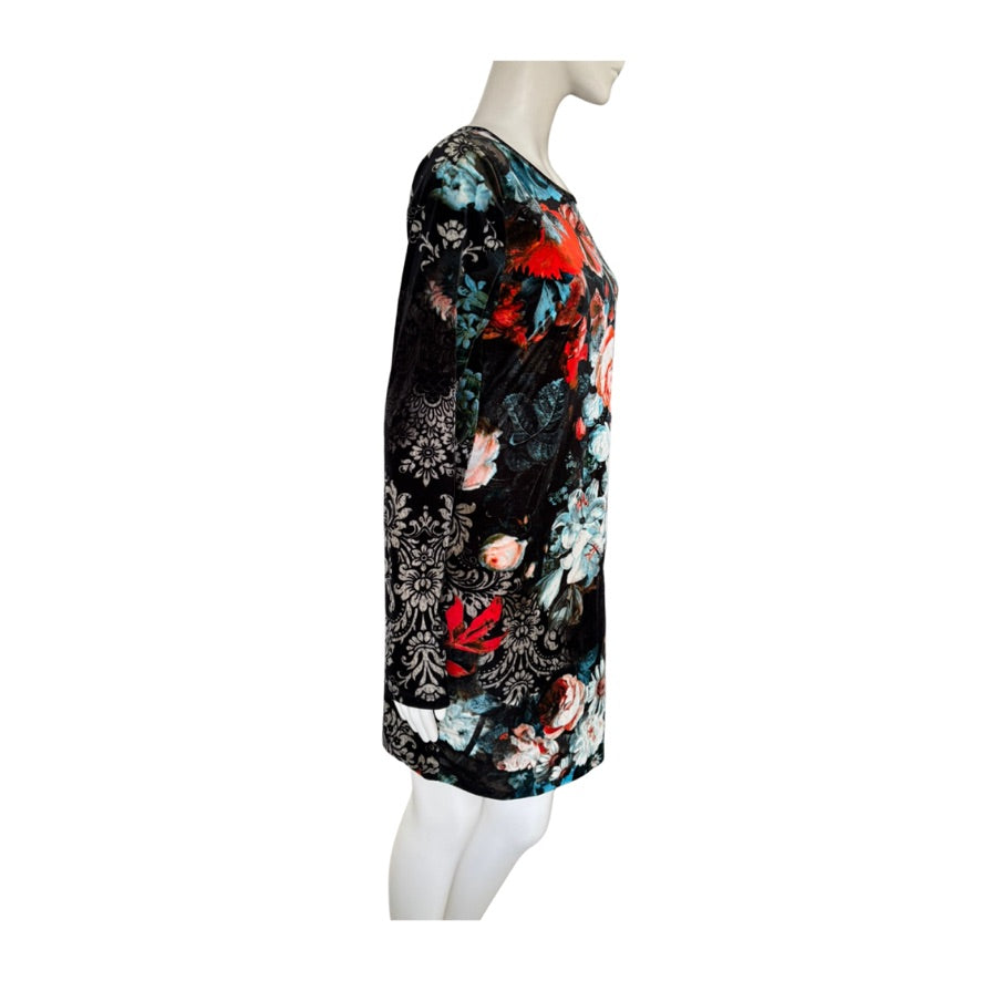 Floral dress on a mannequin against a white background