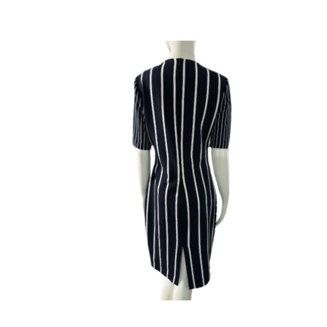 Navy and white striped dress on a mannequin against a white background