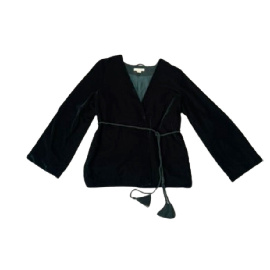 Green velvet jacket on a white background