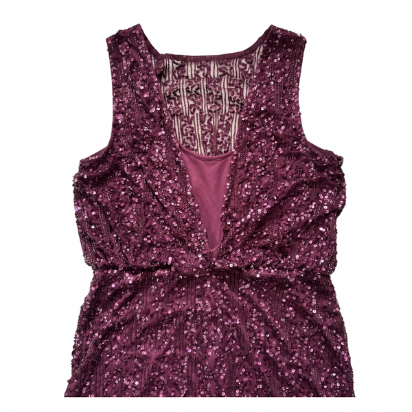 Purple sequin dress on a white background