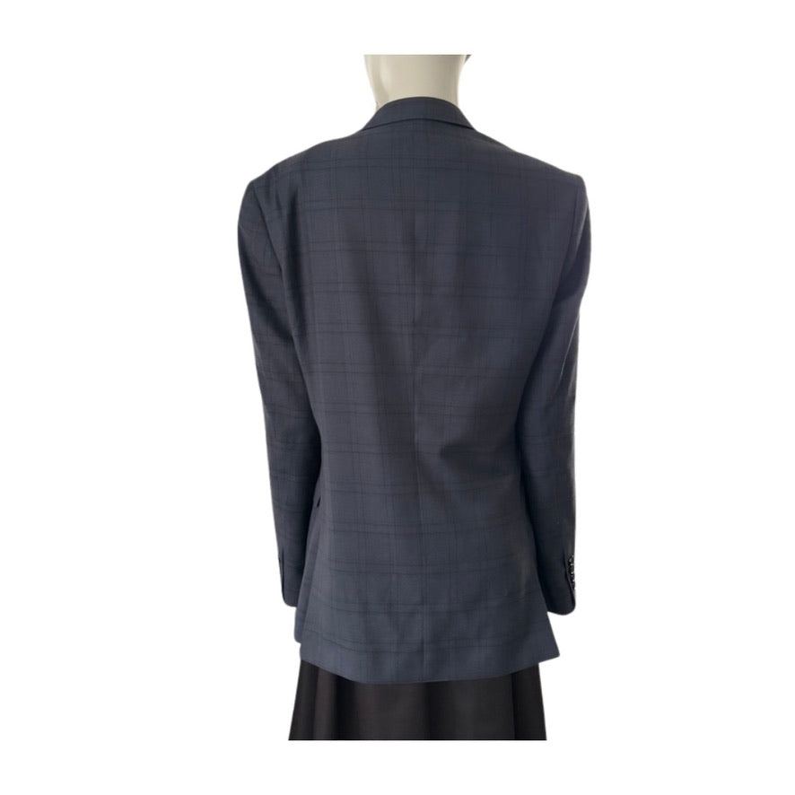 Navy checkered blazer on a mannequin against a white background