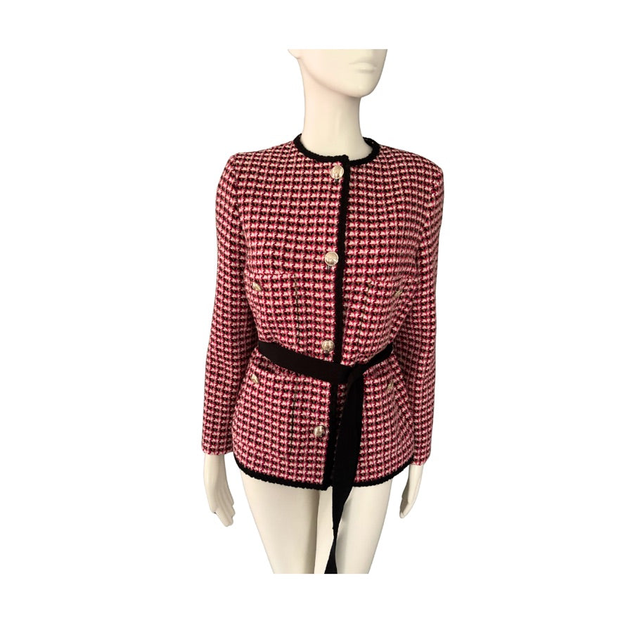 Red and black checkered jacket on a mannequin against a white background