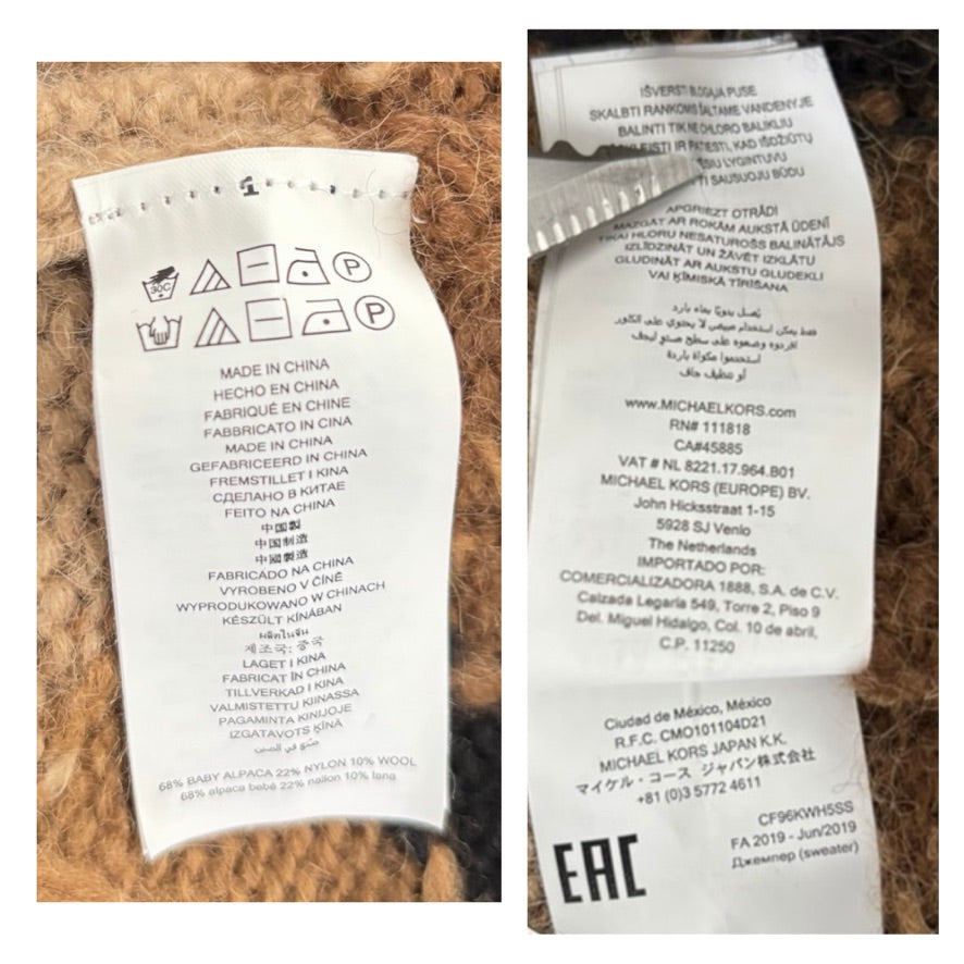 Two clothing labels with text and symbols on a textured background