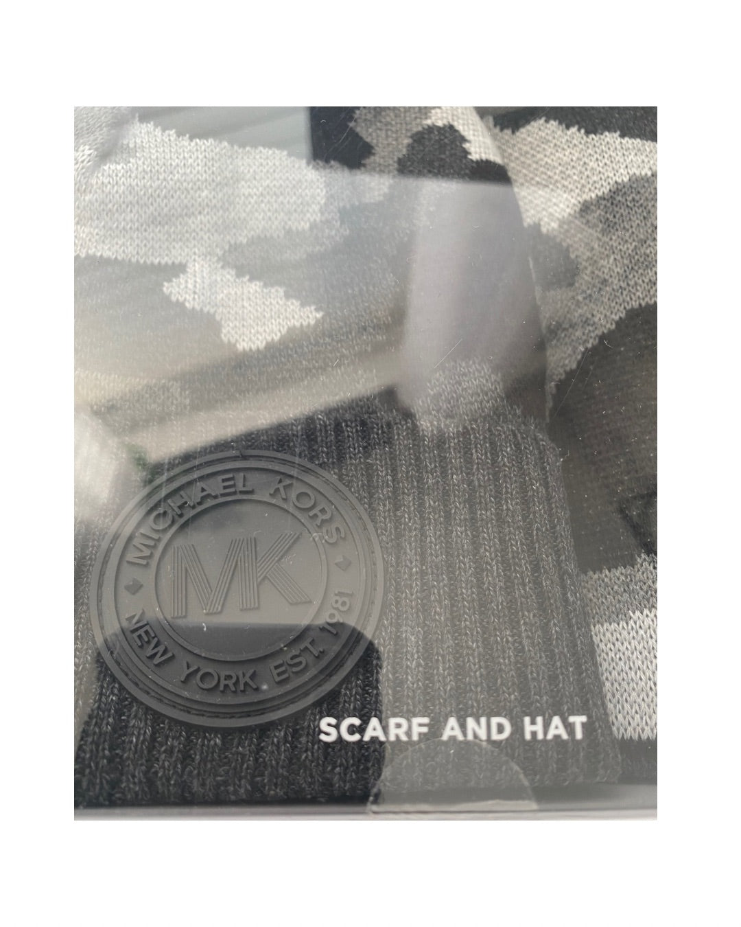 Scarf and hat set with Michael Kors logo on packaging