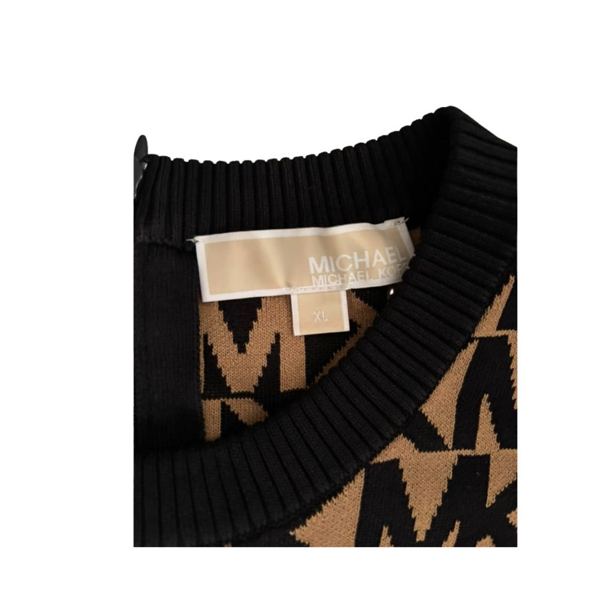 Black and brown patterned sweater with a visible brand label on a white background
