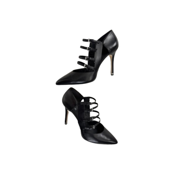 Black high-heeled shoes with strap details on a white background