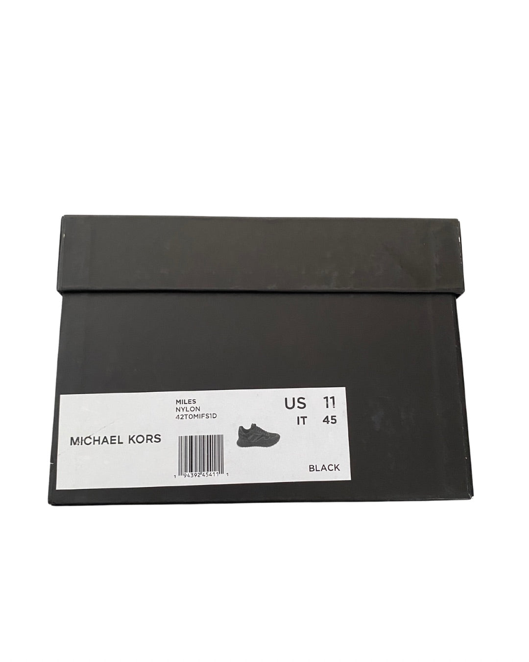 Black shoe box with a label on a white background