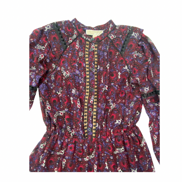 Long-sleeve blouse with a burgundy colourful pattern on a white background