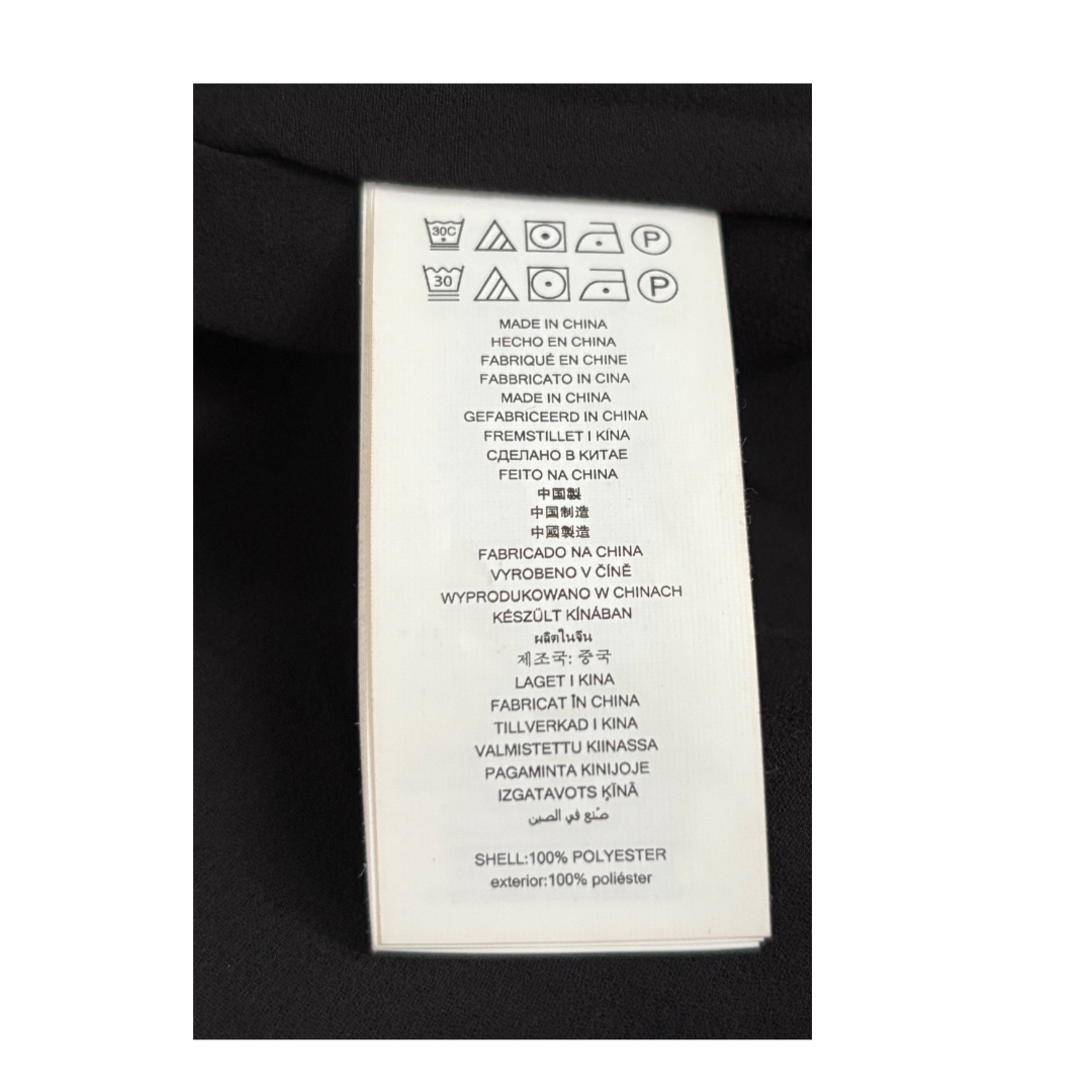 Product label with text and symbols on a black background