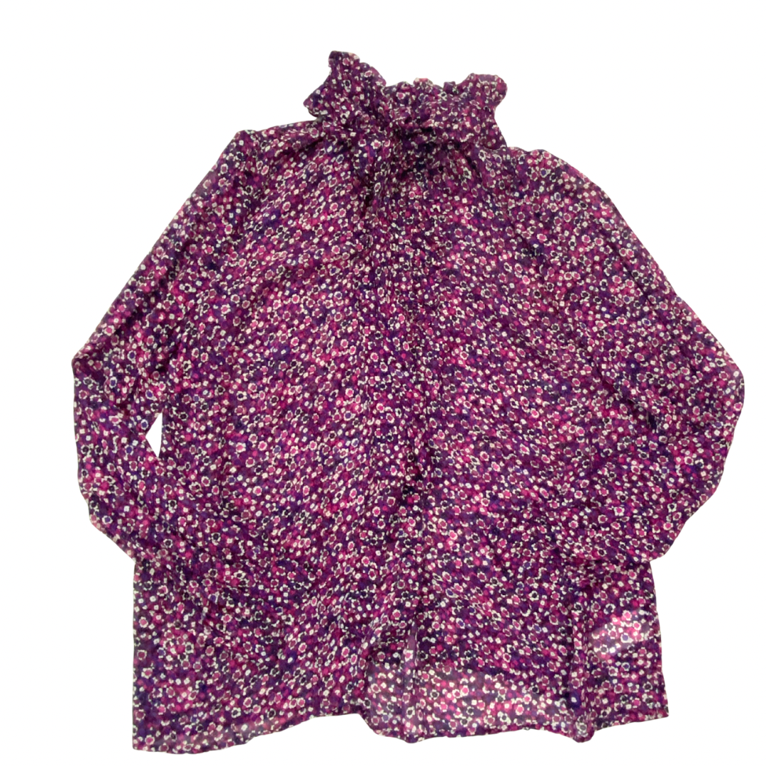 Floral patterned blouse on a white background