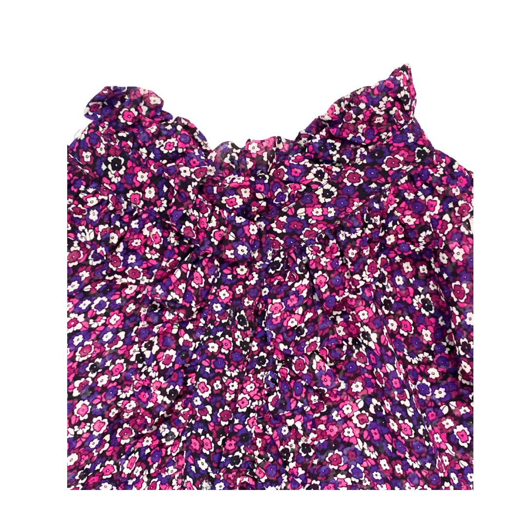 Floral patterned top on a white background