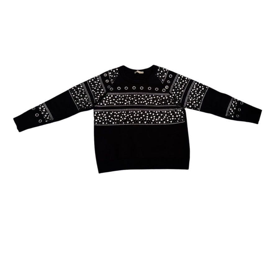 Black sweater with white pattern on a white background