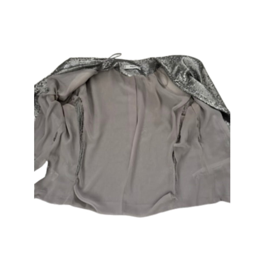 Grey jacket lining with silver sequin details on a white background