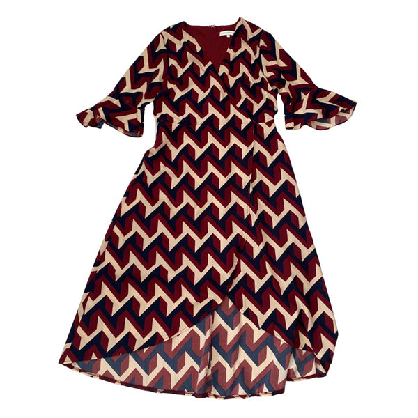 Chevron patterned dress on a white background