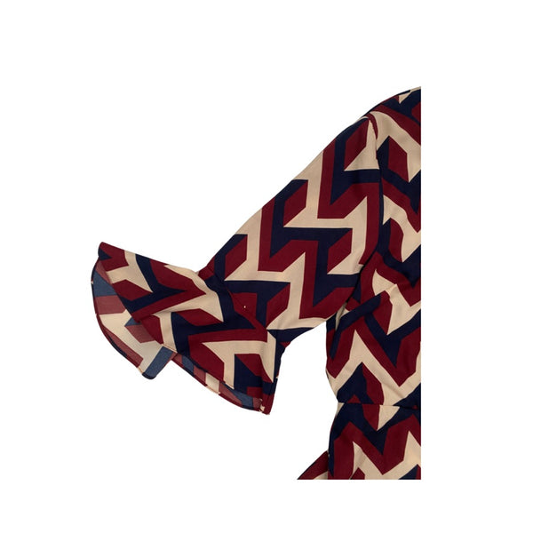 Burgundy and beige geometric patterned bow tie on a white background