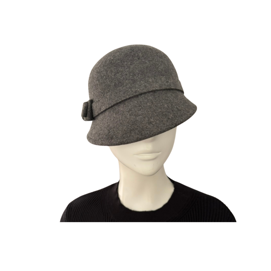 Grey cloche hat on a mannequin head against a white background
