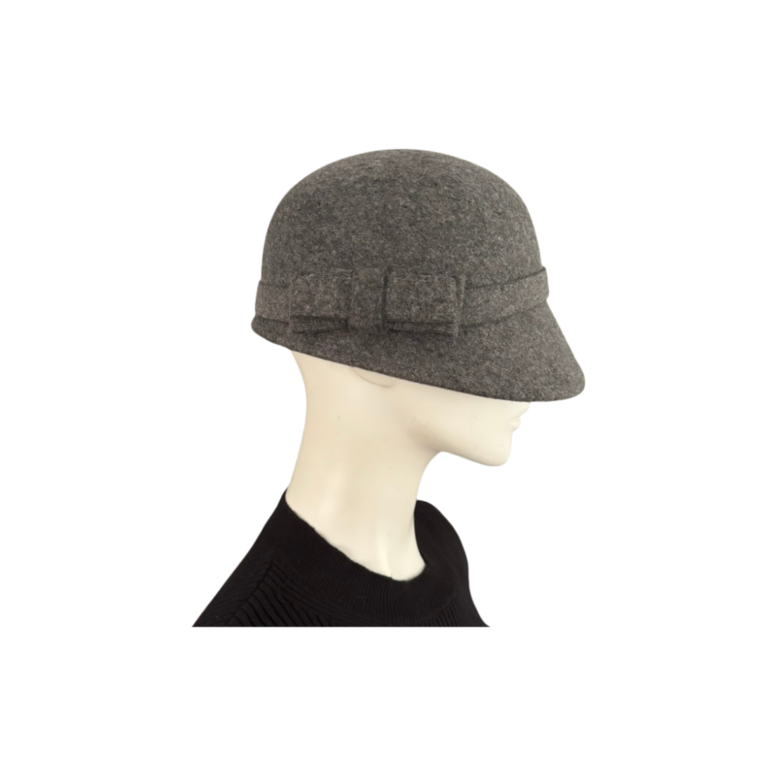 Grey cloche hat on a mannequin head against a white background