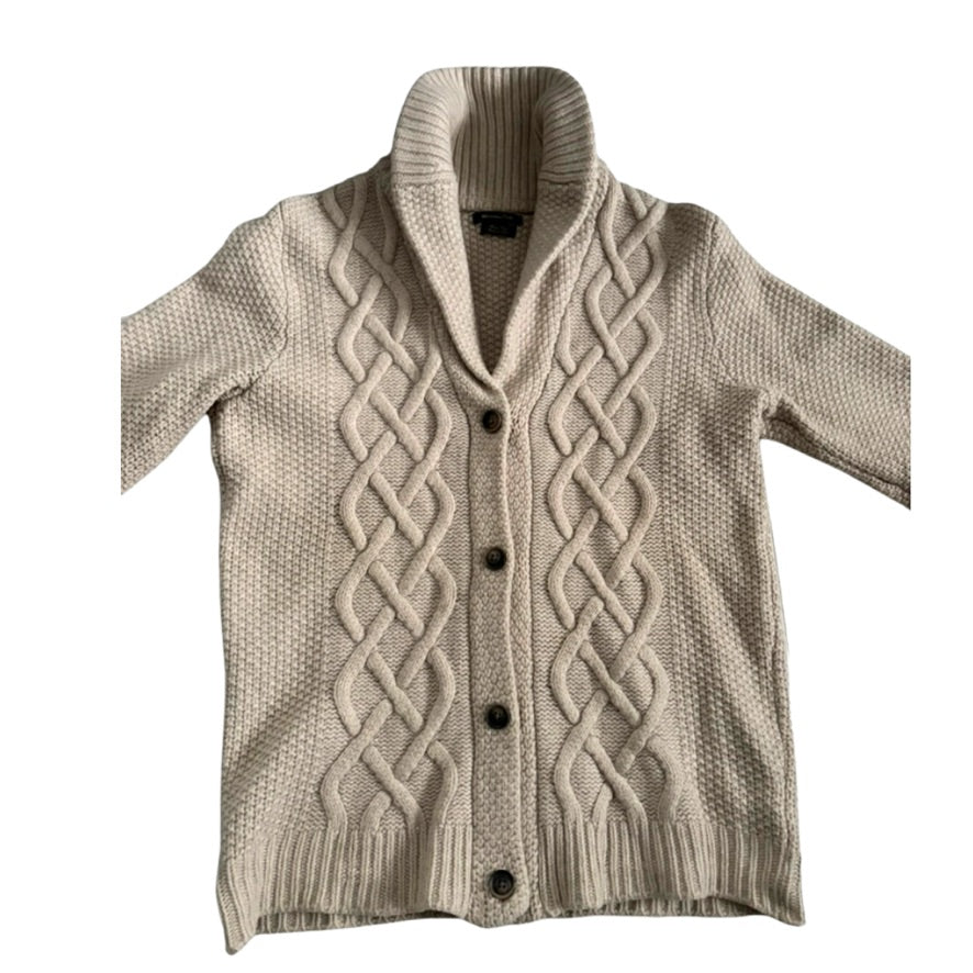 Beige cable knit cardigan on a white background