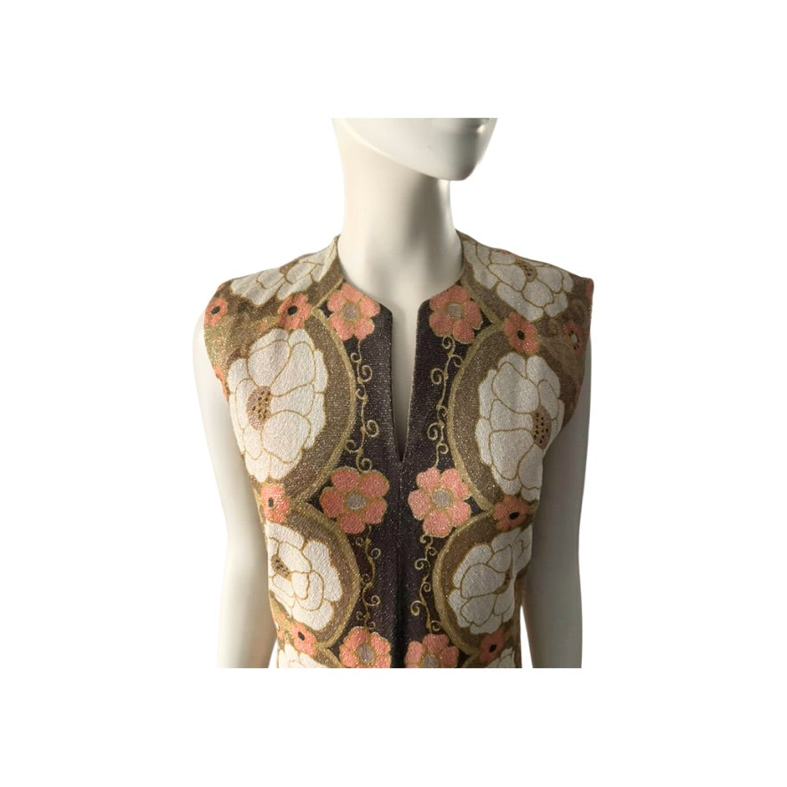 Mannequin wearing a floral patterned vest on a white background