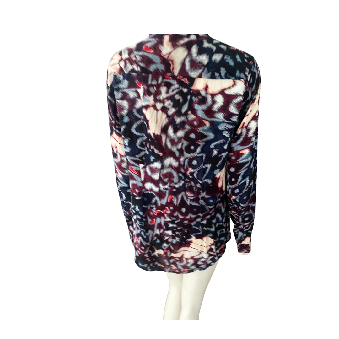 Multicolored patterned shirt on a white background