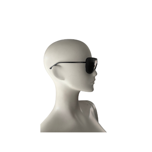 Black sunglasses on a mannequin head against a white background