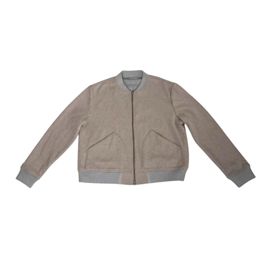Beige jacket with gray trim on a white background