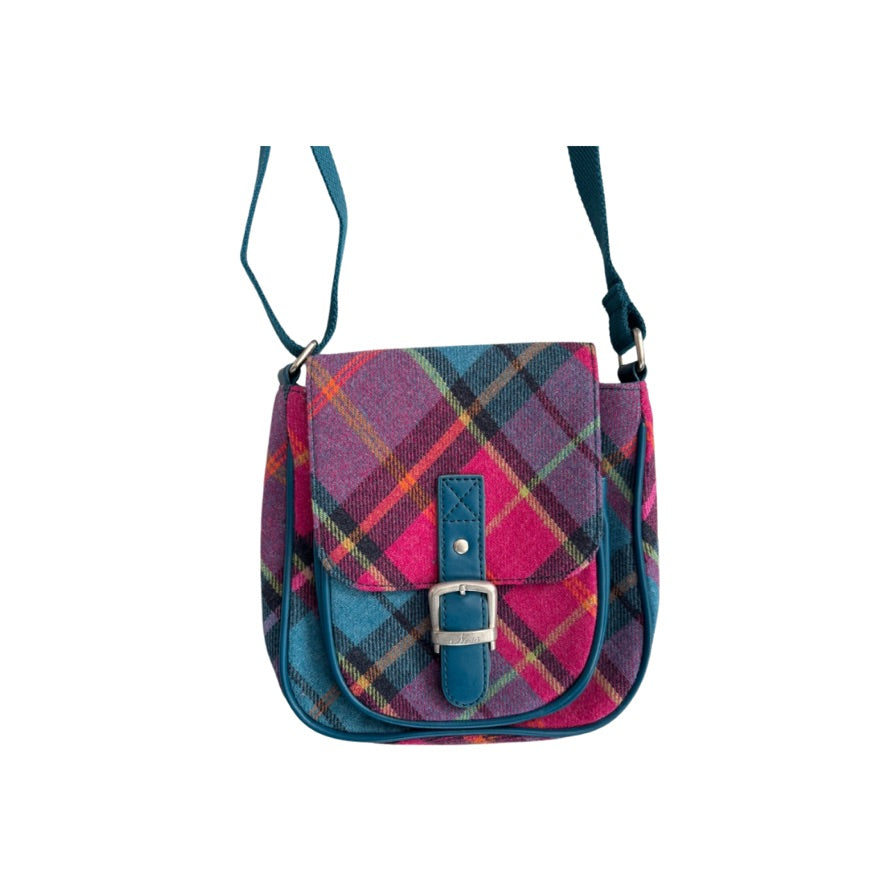 Plaid patterned bag with a buckle on a white background
