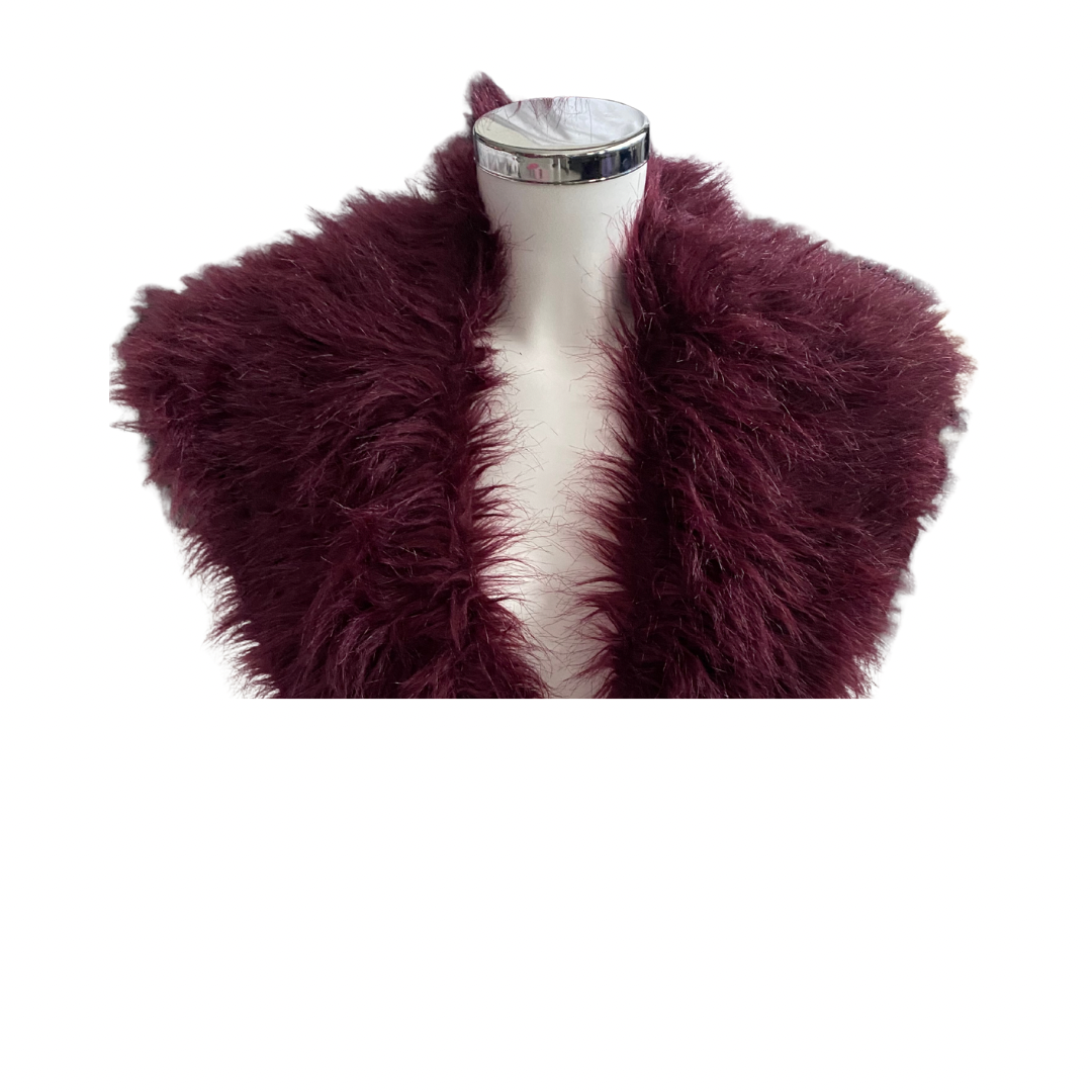 Burgundy shaggy fur shrug on a mannequin against a white background
