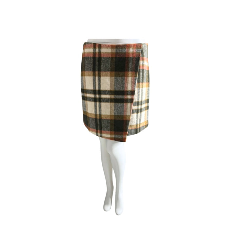 Plaid skirt on a mannequin against a white background