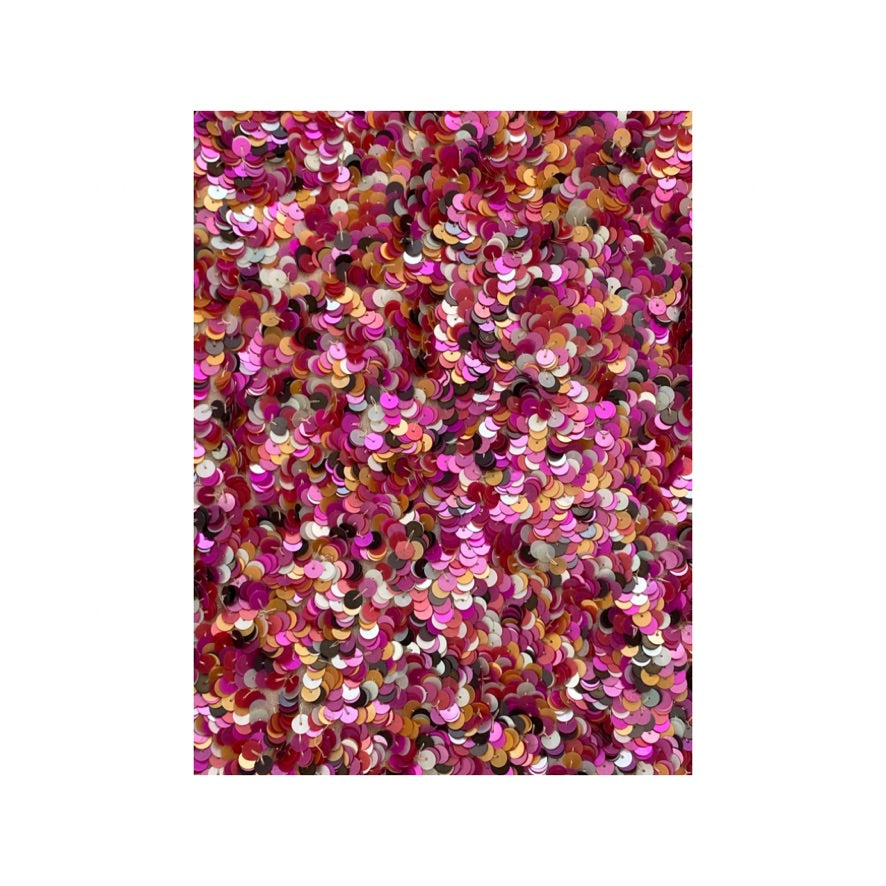 Multicolored sequins on a white background