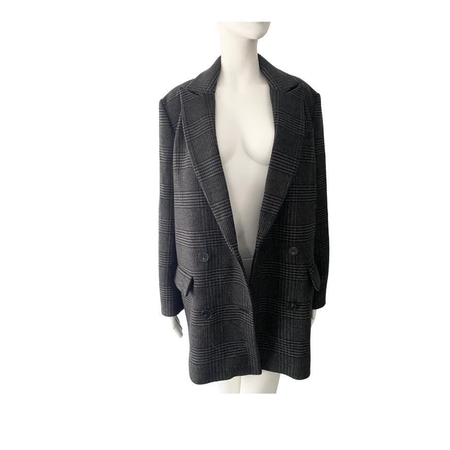 Grey checkered blazer on a mannequin against a white background