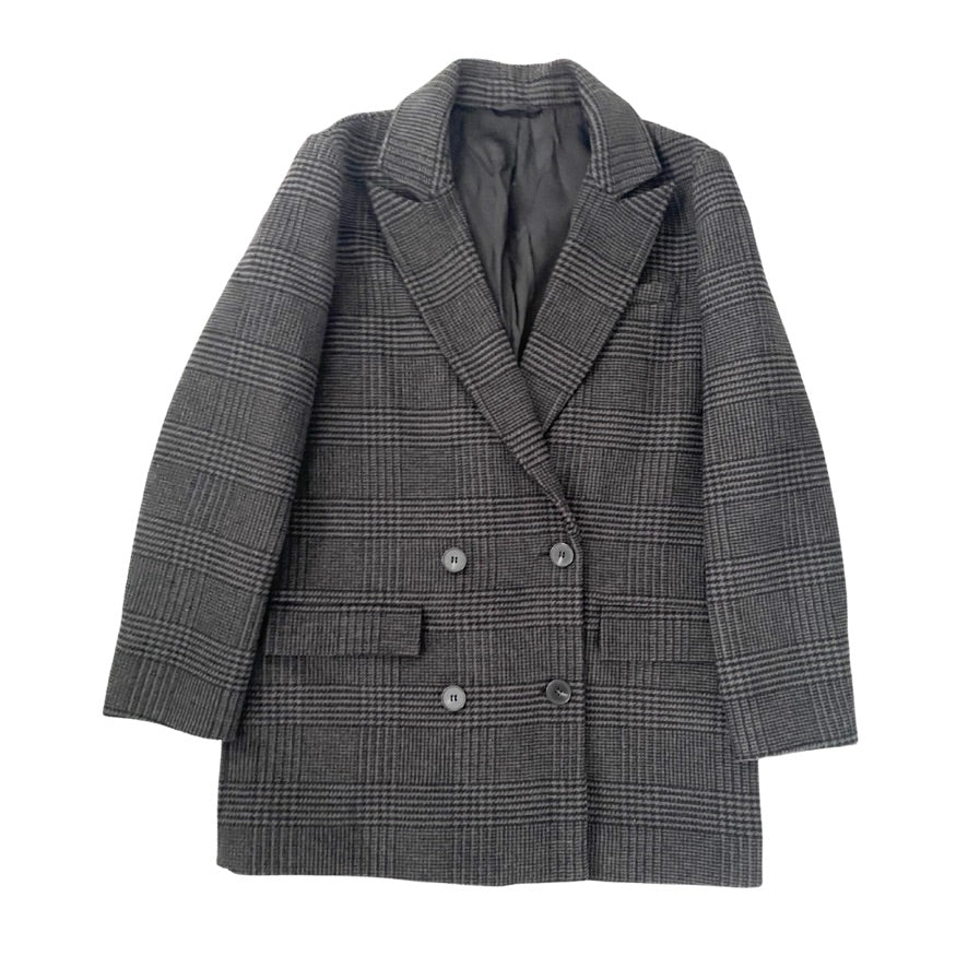 Gray checkered coat on a white background