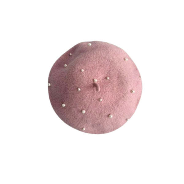 Pink beret with pearl embellishments on a white background